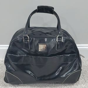 Studio DVF black rolling carry on luggage